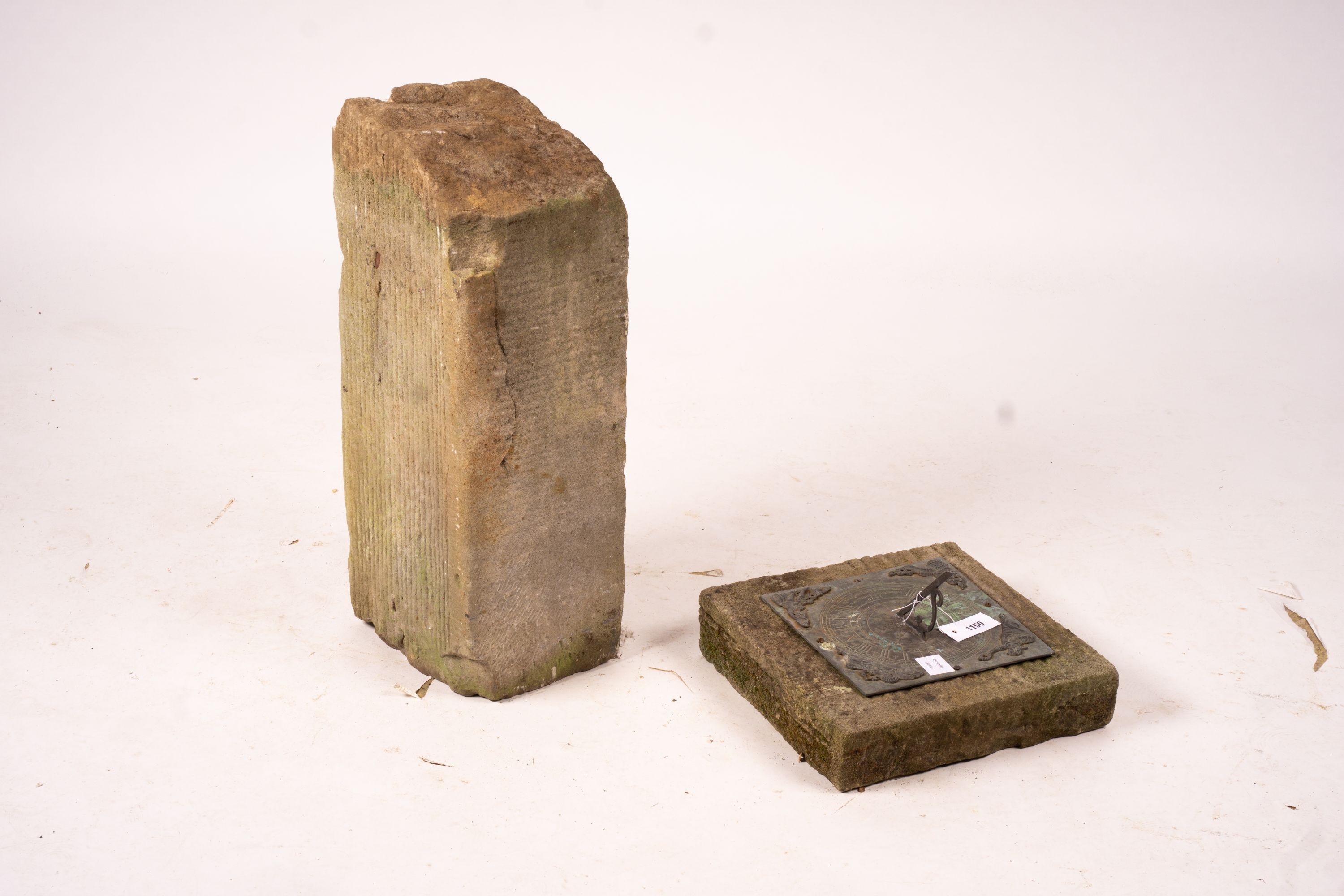 A 17th century style sun dial on Portland stone plinth, height 70cm